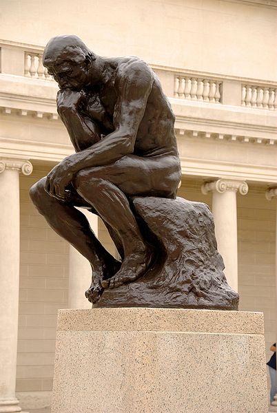 <em>The Thinker</em> by Auguste Rodin